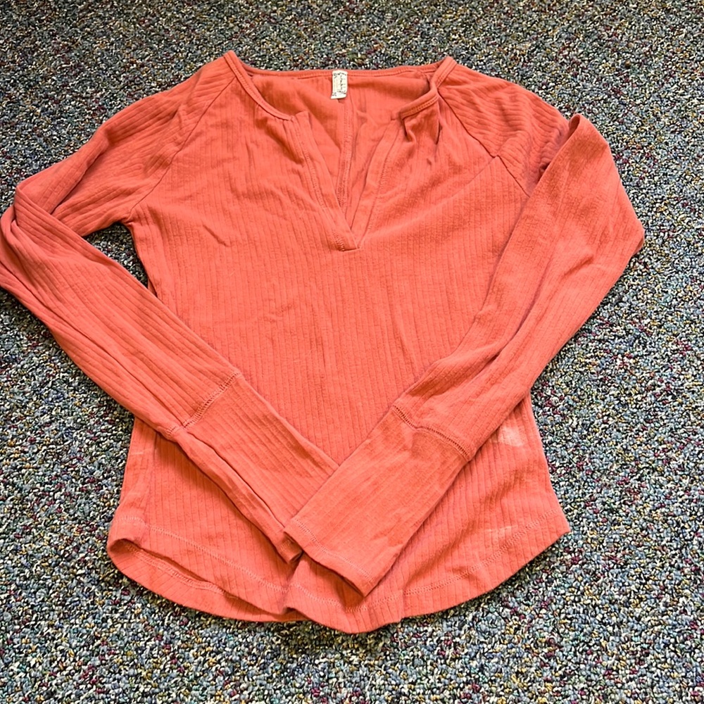 Free people orange long sleeve top. Size medium.